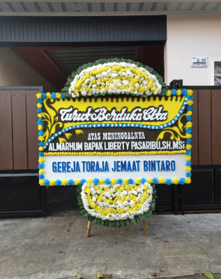 Papan Bunga Duka di Kuripan